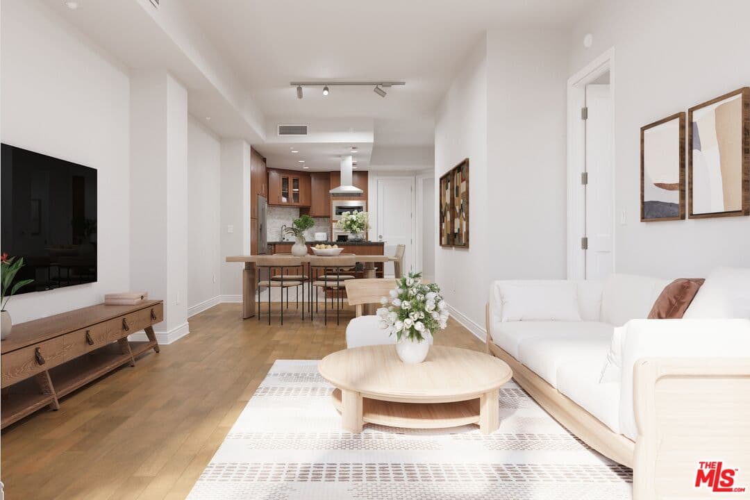 Bright, airy layout ideal for entertaining (photo 2 of 25)