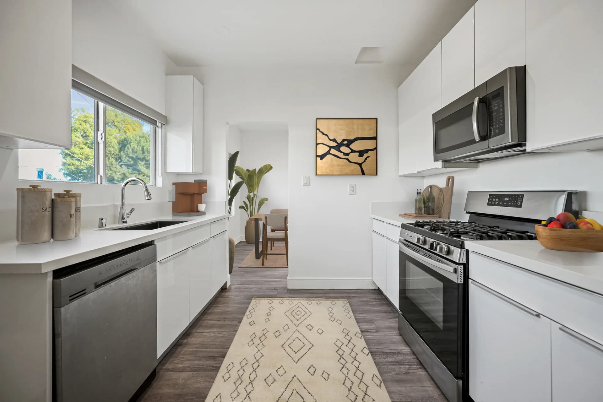 Spanish Style Two Bedroom | All New Appliances | Modern Designer Cabinetry - White Stone Quartz Countertops | Downtown Los Angeles | Boyle Heights | Re-Defining Modern Living — photo 1