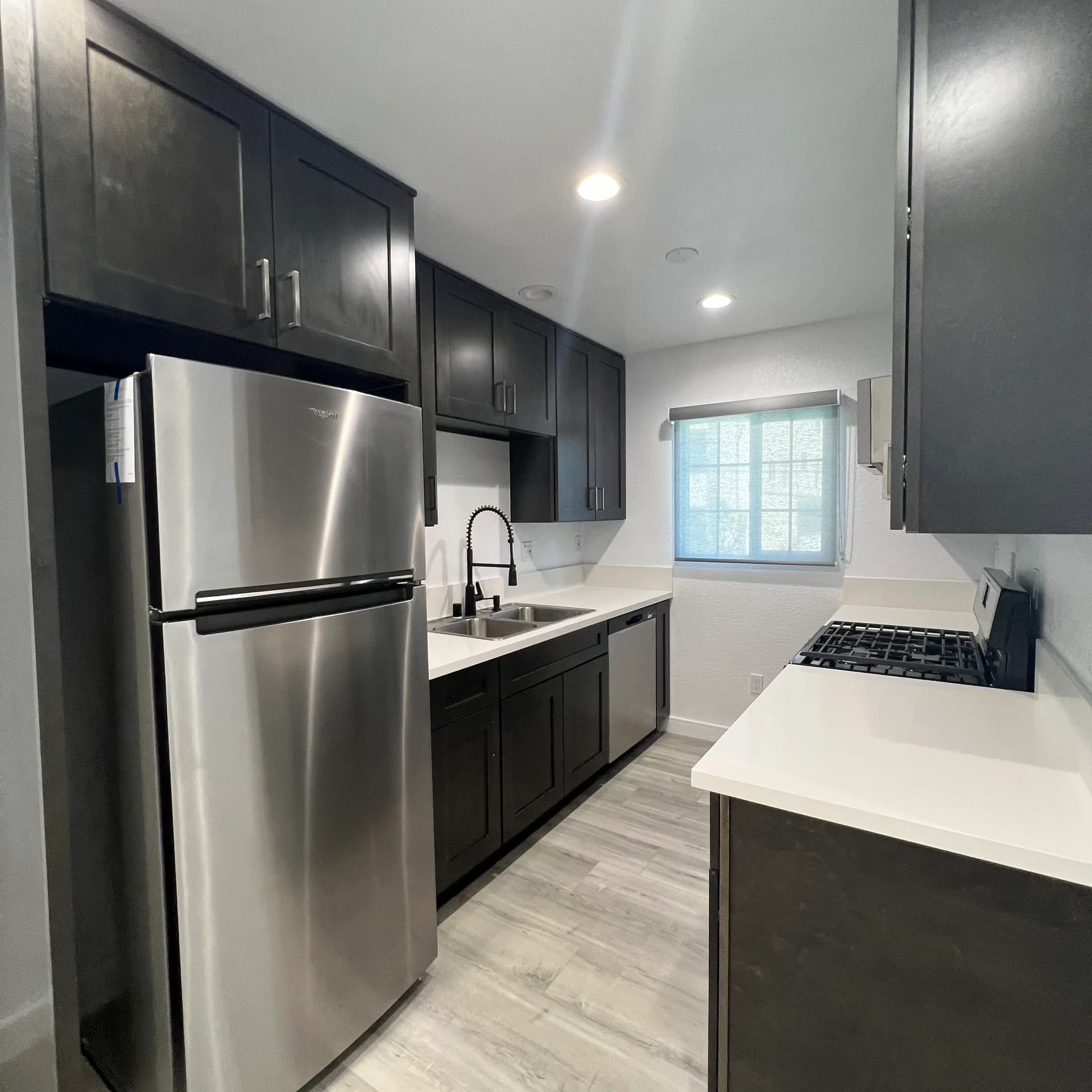 Two Bedroom with Quartz Countertops & New Appliances | Cellular Shade Window Blinds - Spacious Designer Floor Plan - Vinyl Wood Plank Flooring | Chinatown & Downtown LA | Midcentury Modernism Architecture | Re-Defining Modern Living | Covered Parking — photo 1