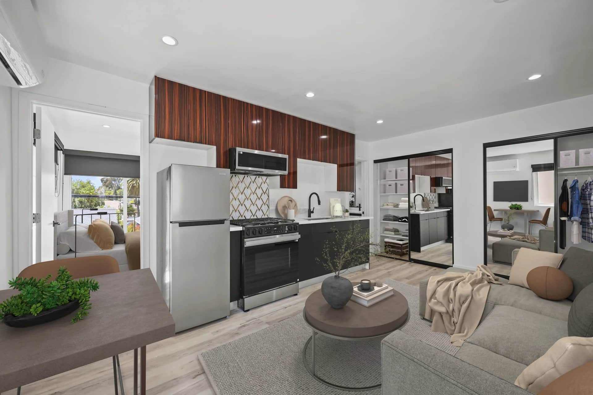 Modern living room with stainless steel appliances and an open layout. (photo 1 of 20)